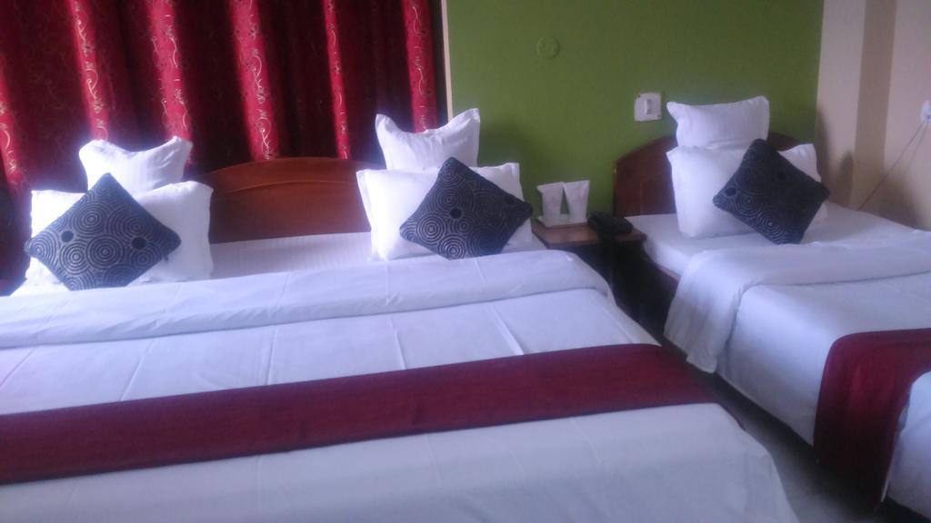 Breeze Hotel Shiliguri Zimmer foto